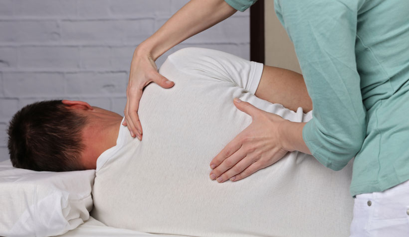 patient receiving spinal postural restorative therapy in Monterey